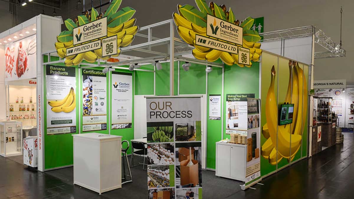 Systemstands 2 System booth with banana motifs and presentation area for fruit products